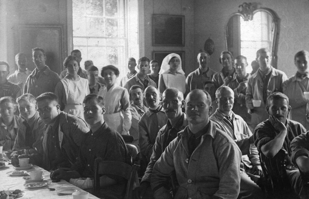 Soldiers seated in hospital dining room